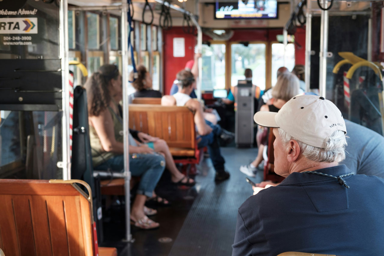 man riding bus